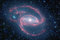 What's happening at the center of spiral galaxy NGC 1097?  